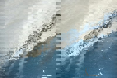 Snow covered mountain and ice shelf