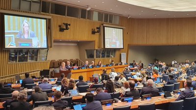 People sat at international united nations conference. 