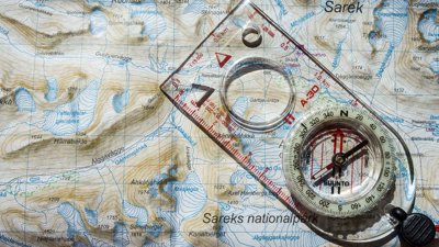 A map showing grid lines and a compass.