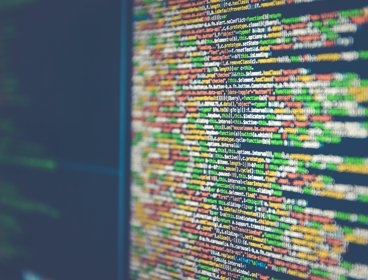 Computer screen with lines of code written across the screen 