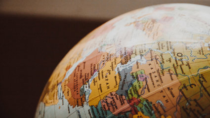 Close up of a globe orientated to show the Middle East and central Asia.