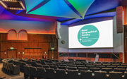 A side-shot of the Ondaatje Lecture Theatre from the front rows of seats. 