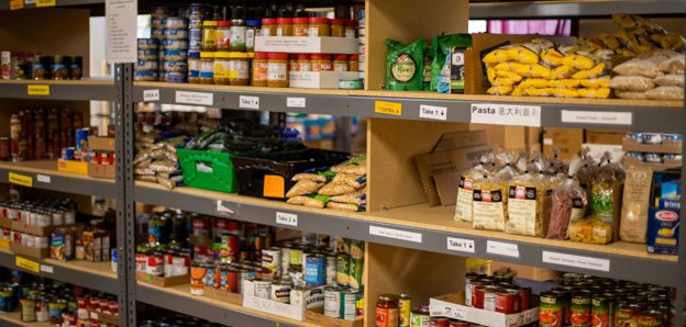 Store cupboard with food items displayed.