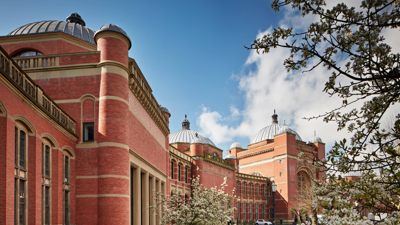 University of Birmingham campus with blossom in the foreground
