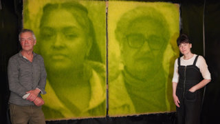 Ackroyd & Harvey standing next to two of their photographic photosynthesis portraits of Chenae Bullock and Elizabeth Solomon