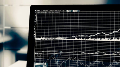 Turned on flat screen monitor showing a flow chart with various data points. Illustrative.