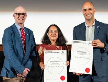 Professor Jamie Woodward presenting to Dr Krithi Karanth and Professor Alexandre Antonelli.