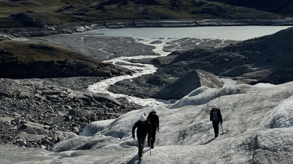 RGS grant recipients cross a short section of the Russell Glacier, Greenland, on return from a day of fieldwork