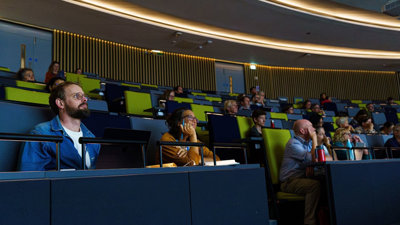 Students watching a lecture.