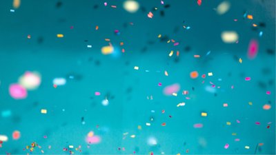 Confetti against blue background.