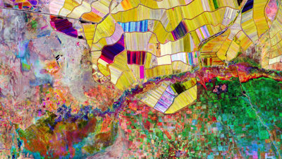 Lucy Tammam's scarf showing an embroidery of an aerial photograph.