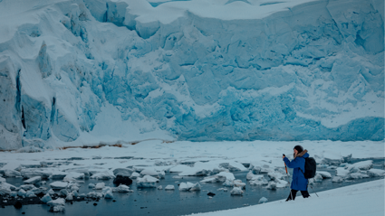 Phoebe Smith ice hiking on ice sheet.