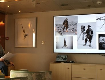 Anne giving a talk on island sky during 2023 Antarctic voyage.