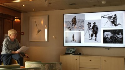 Anne giving a talk on island sky during 2023 Antarctic voyage.
