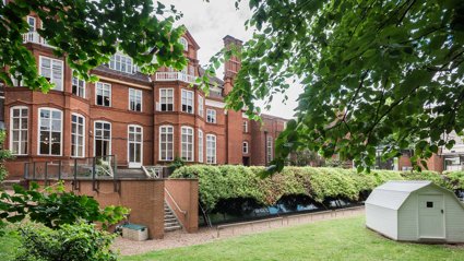 A shot of the garden of the Royal Geographical Society with Lowther Lodge in the background.
