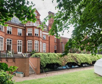 A shot of the garden of the Royal Geographical Society with Lowther Lodge in the background.