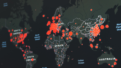Dark grey digital map of the world, with red dots of varying size on every country and territory as well as some national state divisions.