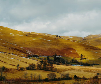 View Over Hills With Light Snow