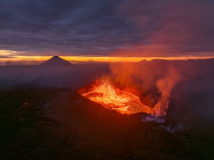 Volcano erupts lava