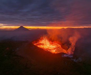 Volcano erupts lava