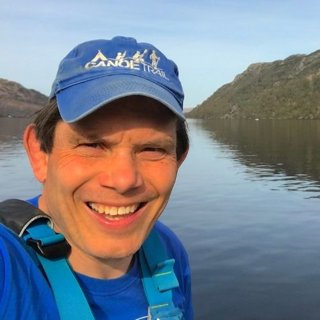 Headshot of Richard Harpham on water.