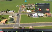 Screenshot of a computer screen showing houses, lawns and roads.