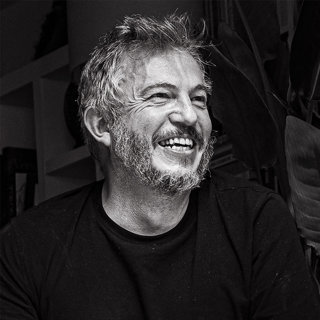 Giles Duley headshot in black and white.