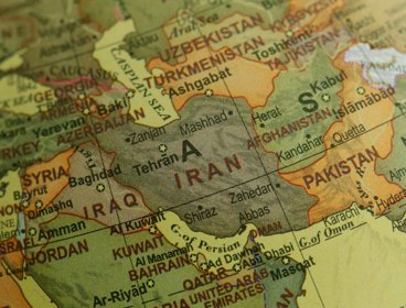 Map of Iran on a globe.