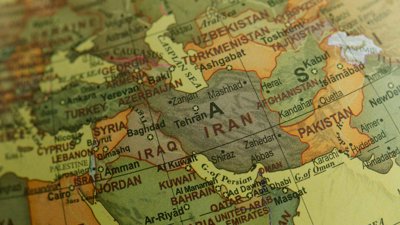 Map of Iran on a globe.