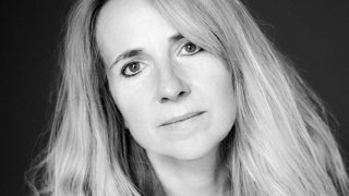 Headshot of Britta Jaschinski in black and white.