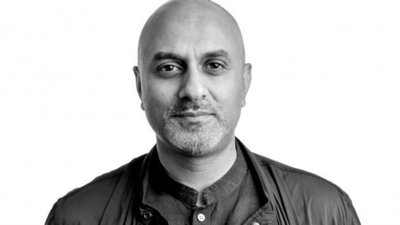 Black and wite headshot of Skinder Hundal.