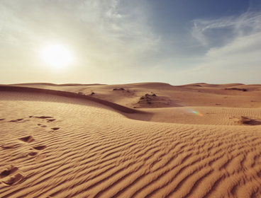 Sand dunes in a hot desert.