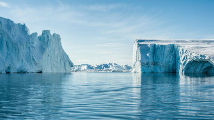 Towering glaciers and ocean in the Arctic.