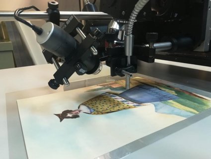 A historic watercolour of a woman in a yellow and blue dress being scanned by a spectrometer