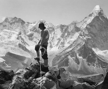 Historical image of Tenzing Norgay standing on summit of Chukhung Peak.