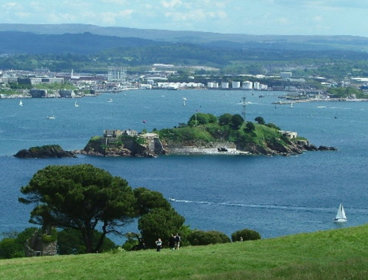 Looking down onto Drake's Island from Mount Edgecumbe Country Park.