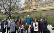 Group of students outside of Houses of Parliament.