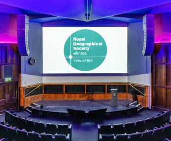 A stage-facing shot of the Ondaatje Lecture Theatre from the upper balcony level. 