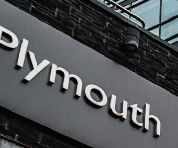 Plymouth Sign On Building