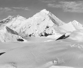 Historical black and white photograph of Mount Everest.