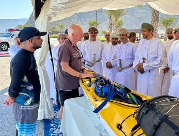 Mark Evans showing people his boat.