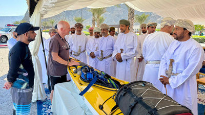 Mark Evans showing people his boat.