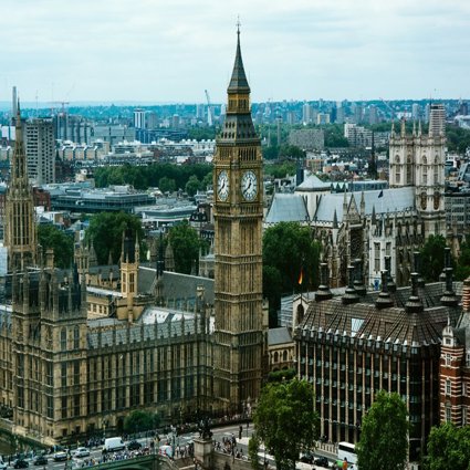 A view of the houses of Parliament in London with Big Ben and London stretching off into the distance