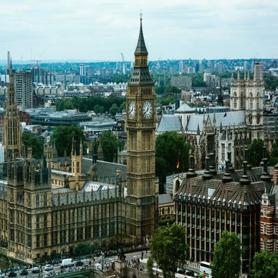 A view of the houses of Parliament in London with Big Ben and London stretching off into the distance