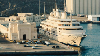 Cruise ship docked at port.