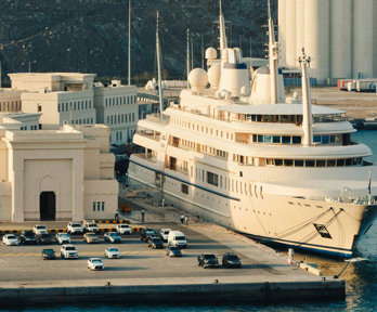 Cruise ship docked at port.