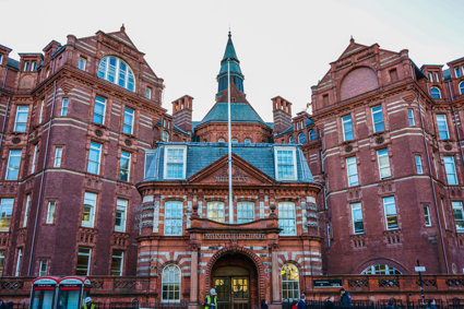 A red brick building with the words University College London on the front