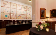 A bar set-up in the Map Room with champagne glasses for a formal reception.
