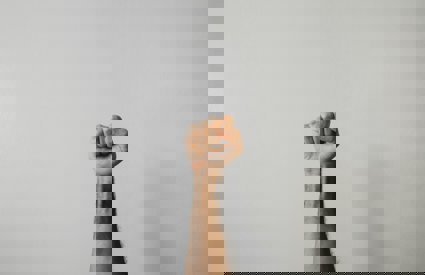 A fist being held in the air