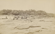 An early photographic image of people with boats